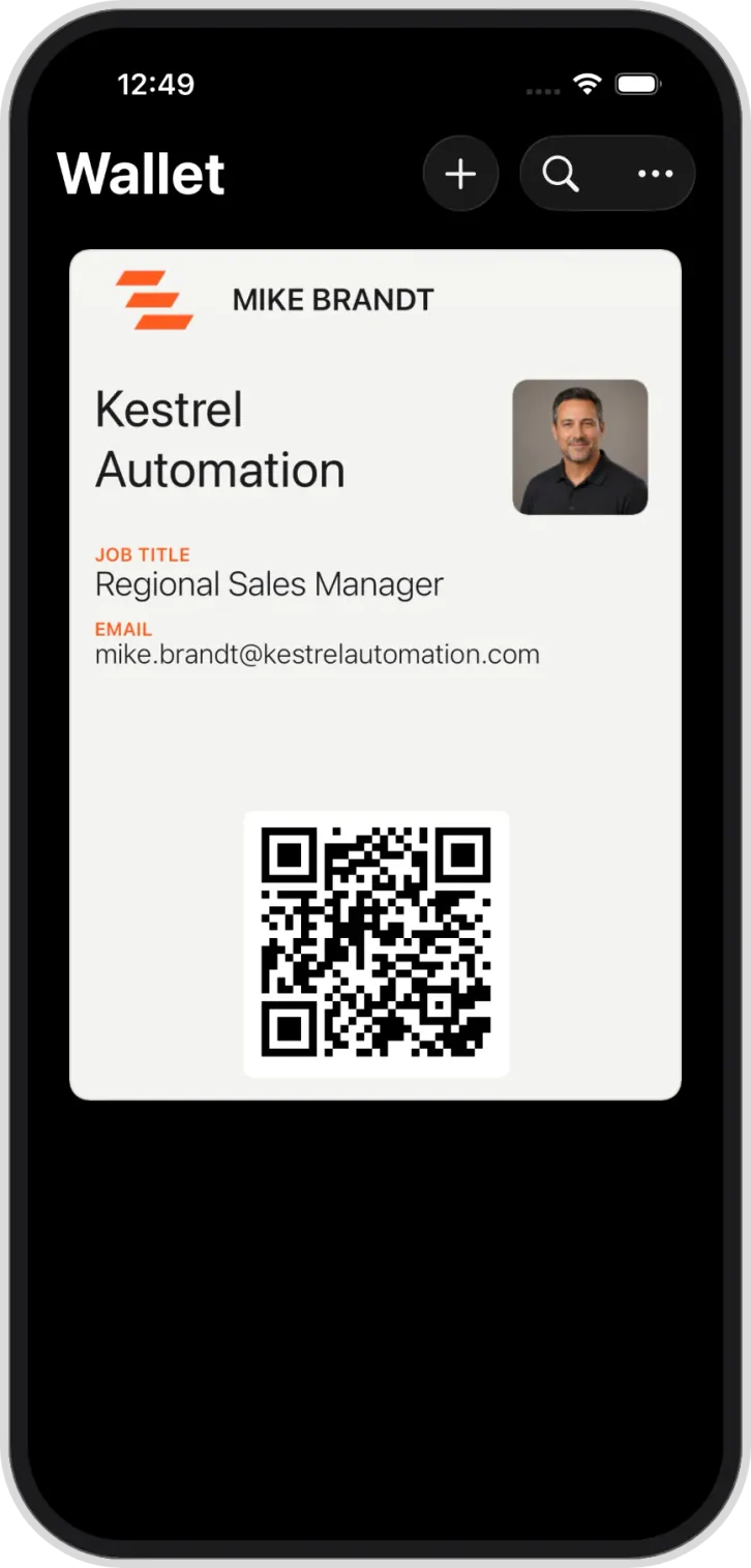 A team member's branded pass in Apple Wallet, shown on a phone
